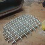 The radiator grill is built up from shaped 1 8 si